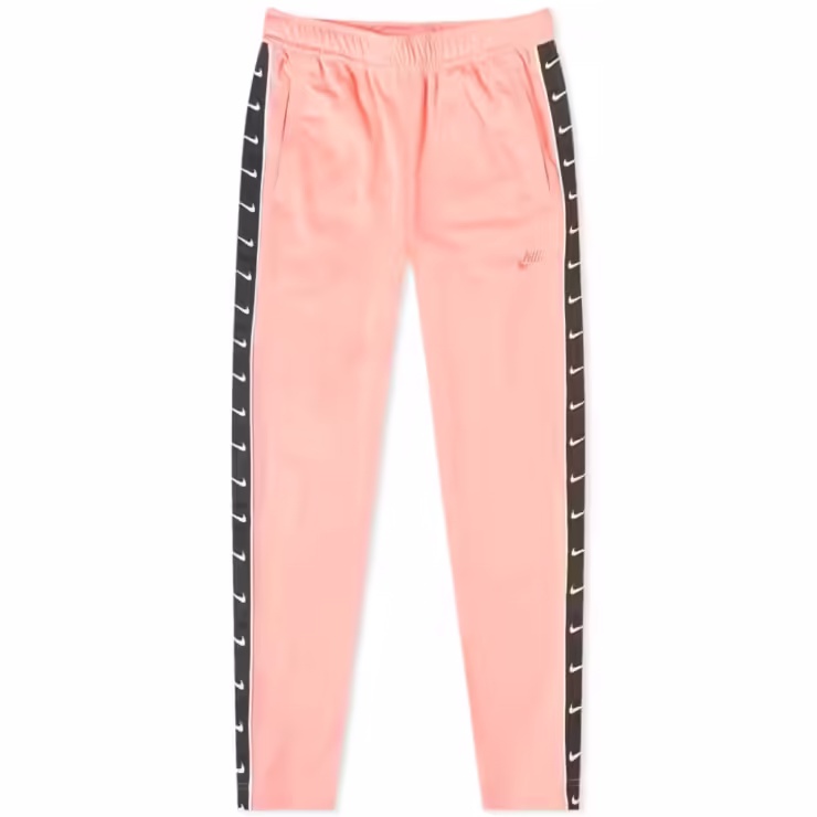 Nike Taped Poly Trackpants in Pink