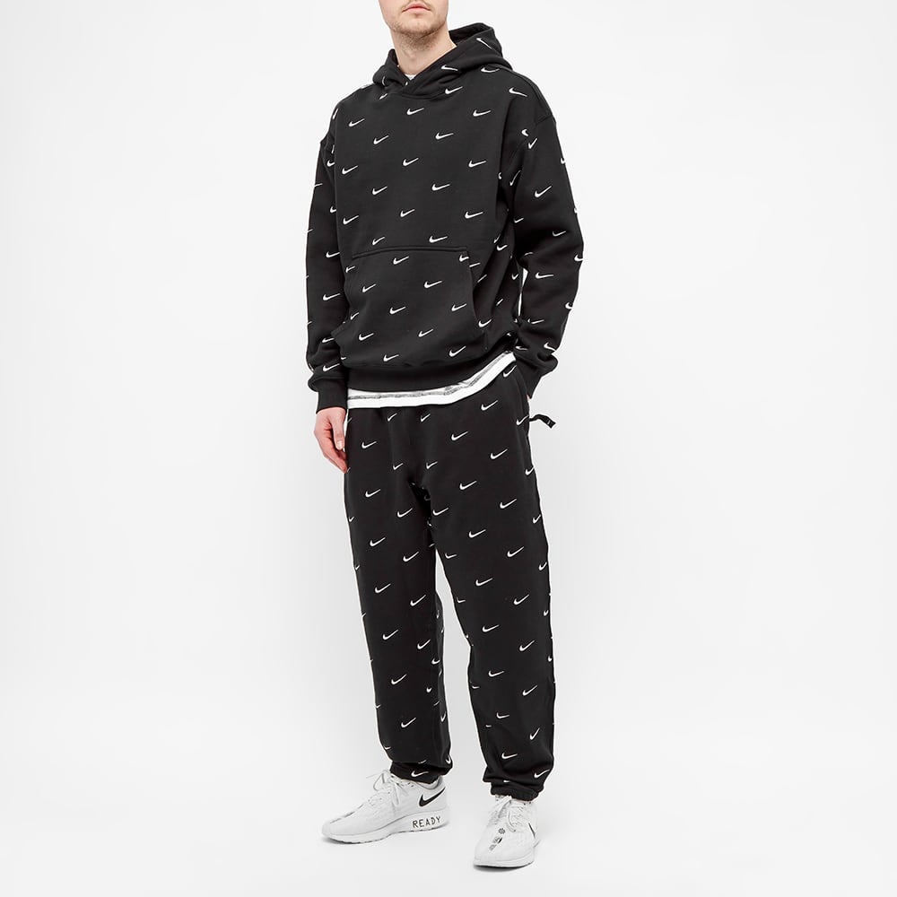 nike jumper with ticks all over